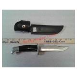 Buck knife in leather sheath