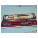 Dagger with decorative sheet in box