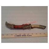 Curved knife with sheath