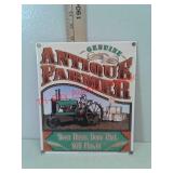 Antique farmer metal sign