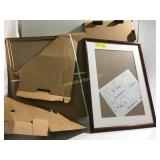 2 photo frames 1 brown 1 gold