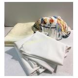 2 white round table cloths, 1 yellow