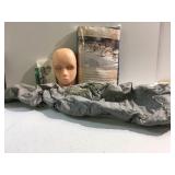 Practice head for make up, tablecloth