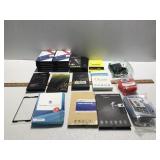 Assorted Phone Protectors And Phone Arm Cases