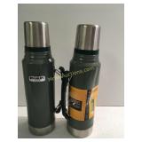 Two Stanley thermos