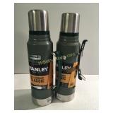 Two Stanley thermos
