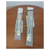 Two packages of sash rods