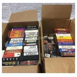 Two boxes of Movies and VHS tapes