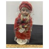 Doll in Red Coat