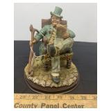 Man in a Chair Figurine