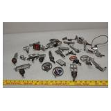 Assorted hood ornaments and pieces