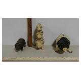 3 cast iron pigs