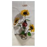 Flowers with lady bug made of tin
