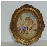 Framed cloth cupids