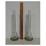2 Coca-Cola syrup test bottles