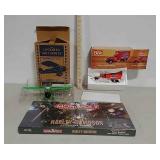 Airplane bank, diecast truck, & Monopoly game
