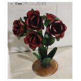 Red roses made of tin