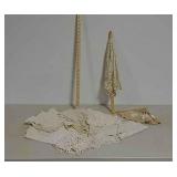 Crocheted doilies, umbrella, fan