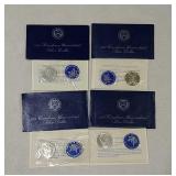 4 Eisenhower U.C. silver dollars