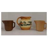 1 advertising pitcher and 2 others