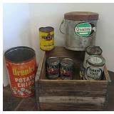 Wooden crate with advertising tins