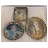 3 advertising trays and other