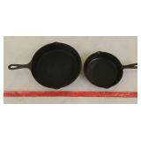 2 cast iron fry pans