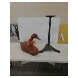 Goose statue and cast iron stand