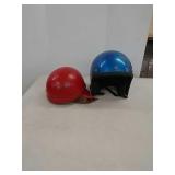 2 motorcycle helmets
