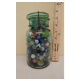 Marbles in blue Ball jar