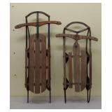 2 wooden sleds