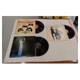 3 records ( Beatles, Mac, & Nicks)