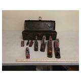 Metal box full of hand wood planes
