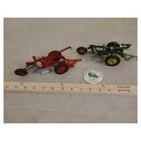 McCormick and John Deere toy plows