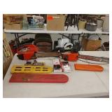 2 chainsaws