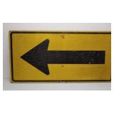 Old plywood road sign