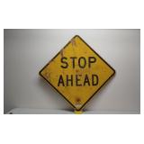 Old plywood road sign