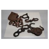 Assorted iron pulleys and more
