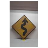 Old plywood road sign