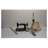 Old sewing machine, lamp & milk bottle caps