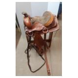 Texas Saddlery leather Western saddle and rack