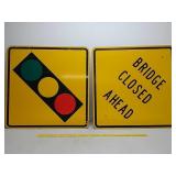 SSA.street signs,light ahead/bridge closed