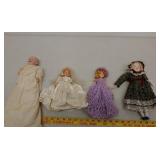 4 bisque and plastic dolls