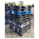 (12) PLASTIC PALLETS