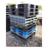 (12) PLASTIC PALLETS