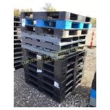 (12) PLASTIC PALLETS