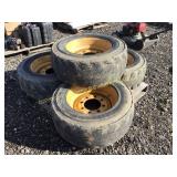 (4) 10-16 SKID STEER WHEELS & TIRES