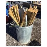 Metal Can of Wooden Spindles