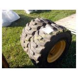 (2) CAT SKID STEER WHEELS & TIRES