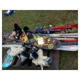 LOT OF SNOWBOARD AND SKIS